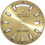 Custom flowing champagne baguette diamond dial. 36mm Day-Date